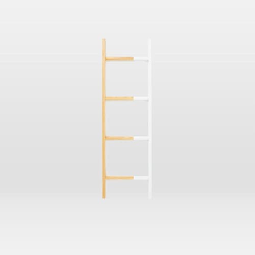 This is a white accent pieces by Alex Cordell called found ladder - small in standard