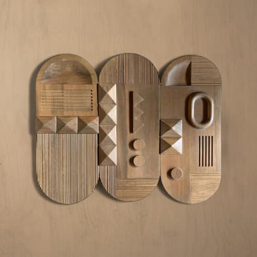This is a brown sculpture art by Meso Casa LLC called triptico wooden wall art (set of 3) in standard
