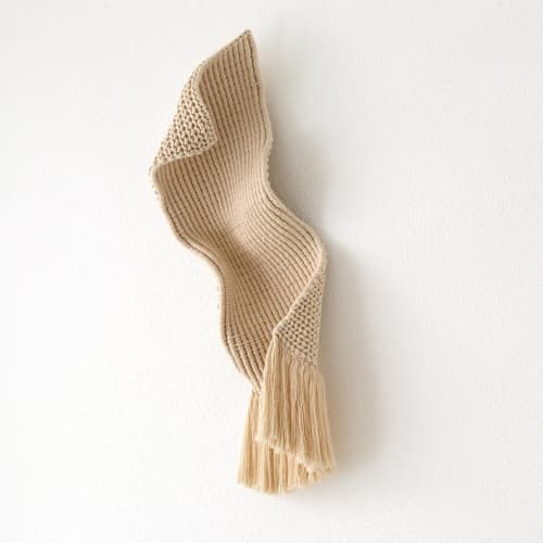 This is a beige sculpture art by Bharti Trivedi called ethereal in standard