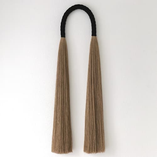 This is a black sculpture art by Bharti Trivedi called arch sculpture in standard
