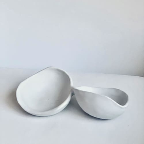 This is a white sculpture art by Cloude Made called resting shells in standard