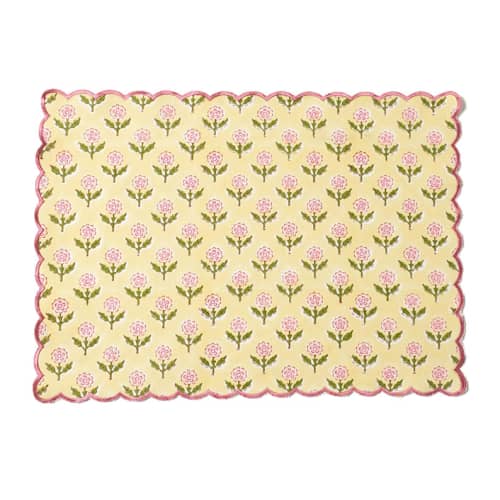 This is a yellow tableware by Inner Child called mona scallop embroidered blockprint placemat in butter yellow in standard