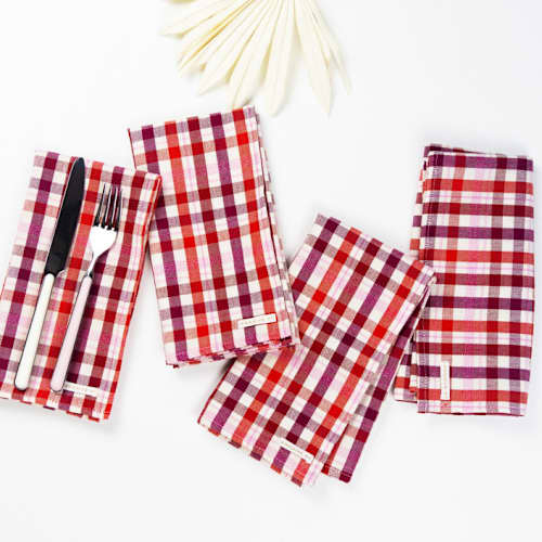 This is a red tableware by Archive New York called noel plaid handwoven cotton napkins, set of 4 in standard