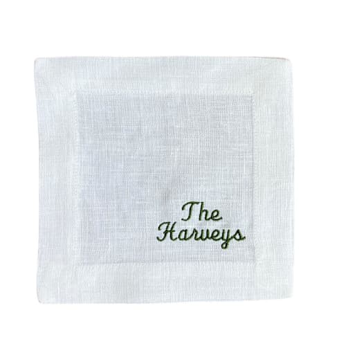This is a white tableware by Virginia Marcello called custom name embroidered cocktail napkins in standard