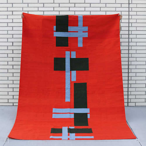 This is a multicolor rugs by Matiz called unidad rug 5'x7' in standard