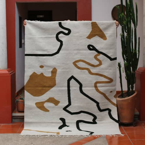 This is a multicolor rugs by Matiz called tuxtepec rug 5'x7' in standard