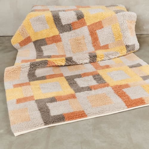 This is a multicolor rugs by Anjali Purohit called shale hand knotted rug in new zealand merino in standard