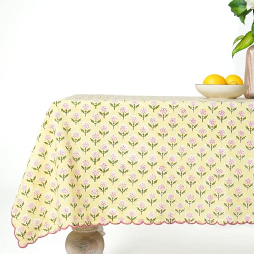 This is a yellow tableware by Inner Child called mona scallop embroidered blockprint tablecloth in butter yellow - 70x120 in standard