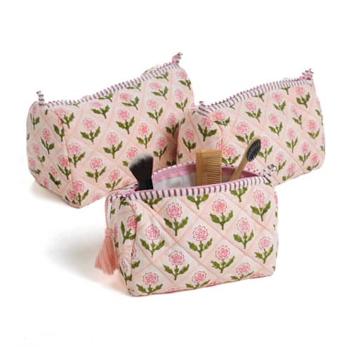 This is a pink back to school supplies by Inner Child called mona blockprint makeup bag in pink - small in standard