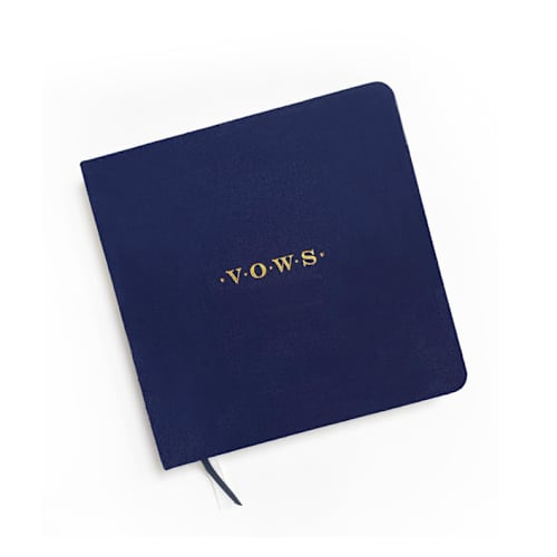 This is a blue vow books by Jessica Cunningham called linen wedding vow book | gold foil on navy blue linen in standard