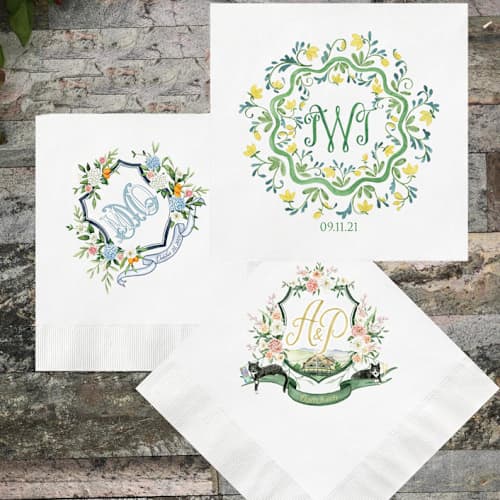 This is a white decorative paper napkins by Papel Custom Design called custom white cocktail napkins - add your wedding crest | pack of 100 in standard