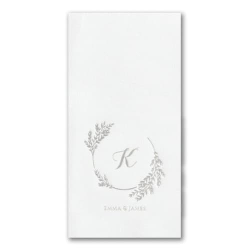 This is a white decorative paper napkins by Papel Custom Design called custom encompassed by greenery premium napkin - guest towel - pack of 100 in standard