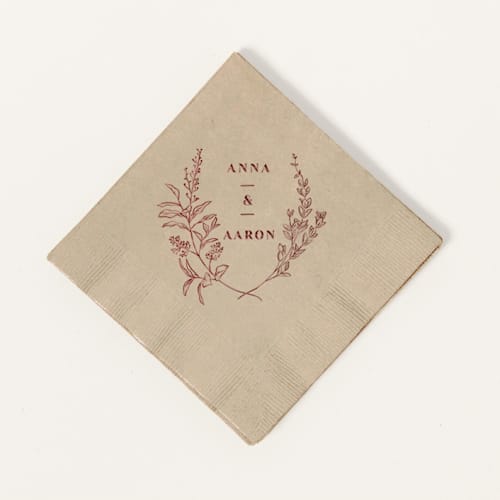 This is a beige decorative paper napkins by ForYourParty called floral names napkin, cocktail size, set of 100 in standard