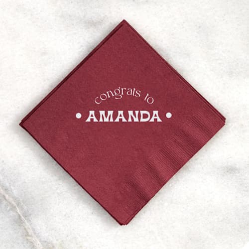 This is a red decorative paper napkins by ForYourParty called congrats to the graduate napkin, cocktail size, set of 50 in standard