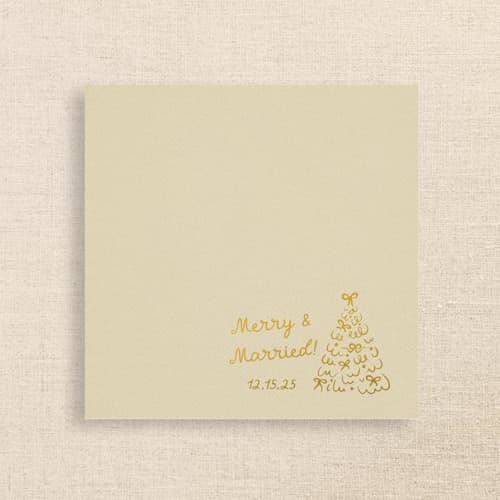 This is a beige decorative paper napkins by Papel Custom Design called merry & married champagne linen-like napkin with holiday tree design | pack of 50 in standard