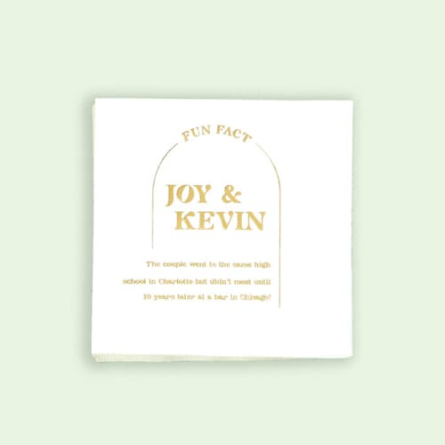 This is a white decorative paper napkins by ForYourParty called arch fun fact napkin, cocktail size, set of 100 in standard