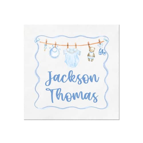 This is a white decorative paper napkins by Papel Custom Design called baby boy vintage clothesline personalized shower cocktail napkins | pack of 50 in standard