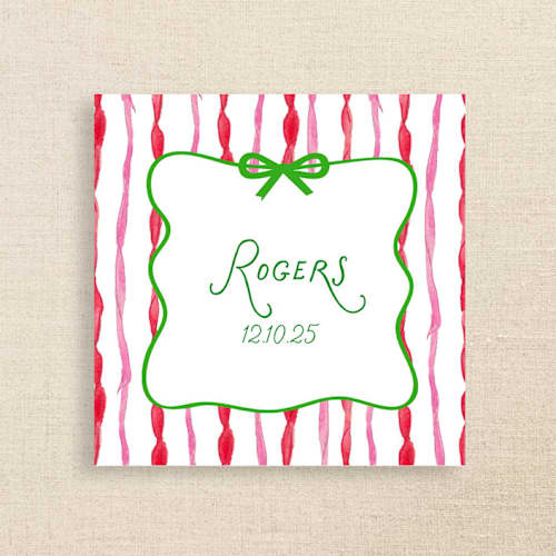 This is a multicolor decorative paper napkins by Papel Custom Design called fun holiday striped name personalized cocktail napkins | pack of 50 premium quality in standard