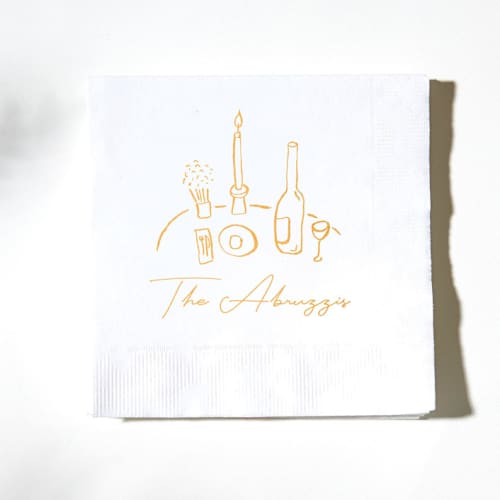 This is a white decorative paper napkins by ForYourParty called food, family, friends napkins in standard