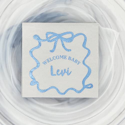 This is a gray decorative paper napkins by ForYourParty called ribbon frame welcome baby napkin, cocktail size, set of 50 in standard
