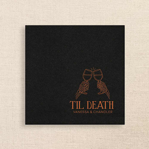 This is a black decorative paper napkins by Papel Custom Design called “til death” black linen-like napkin with skeleton toast design in standard