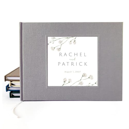 This is a gray guest books by Transient Books called custom wedding guest book · classic floral accents · gray linen in standard