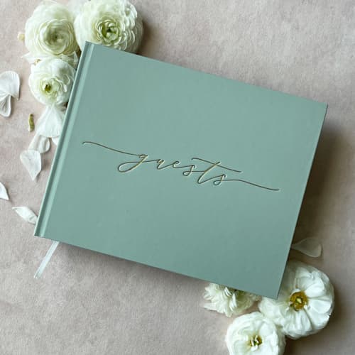 This is a green guest books by Barbara Gregory called sage green minimalist guest book in standard
