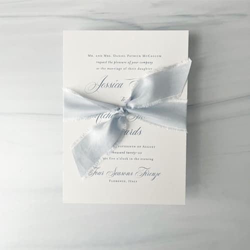 This is a blue wedding ribbon by Honey Silks Co called heirloom collection silk ribbon - pale dusty blue 1" in standard