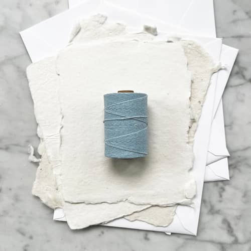 This is a blue wedding ribbon by Jenny Sanders called baby blue waxed linen twine, 4-ply in standard
