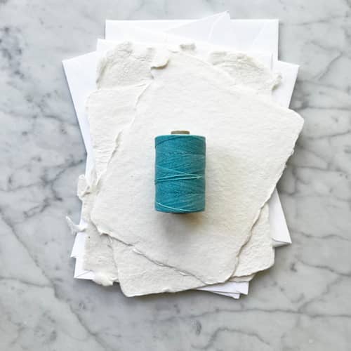 This is a blue wedding ribbon by Jenny Sanders called caribbean blue waxed linen twine, 2-ply in standard