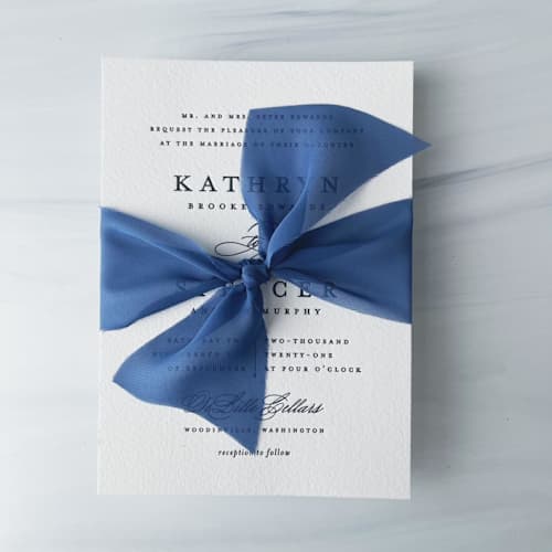 This is a blue wedding ribbon by Honey Silks Co called 2" signature sheer - dutch blue in standard