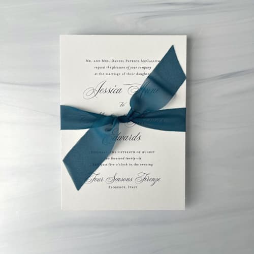 This is a blue wedding ribbon by Honey Silks Co called signature sheer invitation ribbon - deep teal in standard