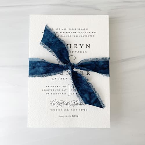 This is a blue wedding ribbon by Honey Silks Co called 1" cotton ribbon - deep ocean in standard