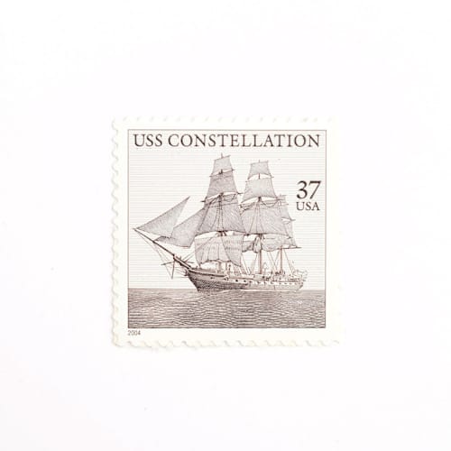 This is a gray stamps by Flourish Fine Writing called 37 cent uss constellation postage stamps // set of 10 // unused vintage postage in standard