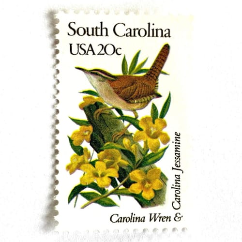 This is a yellow stamps by Heritage Post House called south carolina postage stamps | state bird and flower issue | carolina wren & carolina jessamine | vintage unused usps postage 20c | pack of 10 in standard