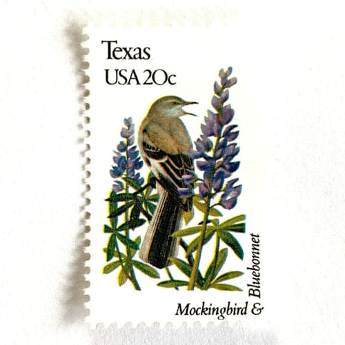 This is a purple stamps by Heritage Post House called texas postage stamps | state bird and flower issue | mockingbird & bluebonnet | vintage unused usps postage 20c | pack of 10 in standard
