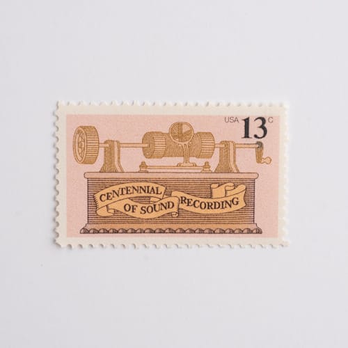 This is a pink stamps by Flourish Fine Writing called 13 cent pink and gold sound recording postage stamps // set of 10 // unused vintage stamps in standard