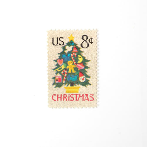 This is a green stamps by Flourish Fine Writing called 8 cent christmas tree needlepoint postage stamps // set of 10 // unused vintage holiday stamps in standard