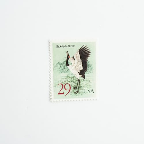This is a green stamps by Flourish Fine Writing called 29 cent black necked crane postage stamps // set of 10 // unused vintage stamps in standard