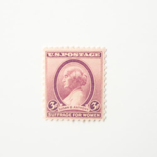 This is a pink stamps by Flourish Fine Writing called 3 cent susan b anthony postage stamps // set of 10 // unused vintage postage in standard
