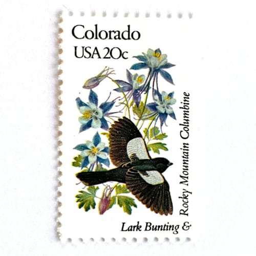 This is a blue stamps by Heritage Post House called colorado postage stamps | state bird and flower issue | lark bunting & rocky mountain columbine | vintage unused usps postage 20c | pack of 10 in standard