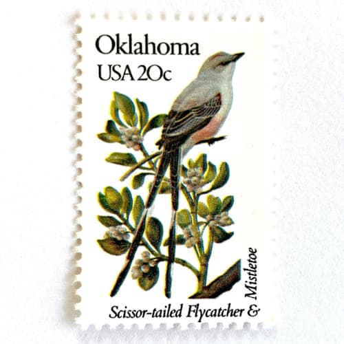 This is a green stamps by Heritage Post House called oklahoma postage stamps | state bird and flower issue | scissor-tailed flycatcher & mistletoe | vintage unused usps postage 20c | pack of 10 in standard