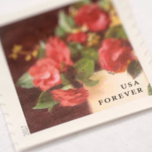 This is a red stamps by Flourish Fine Writing called red camellia forever stamps // set of 10 in standard