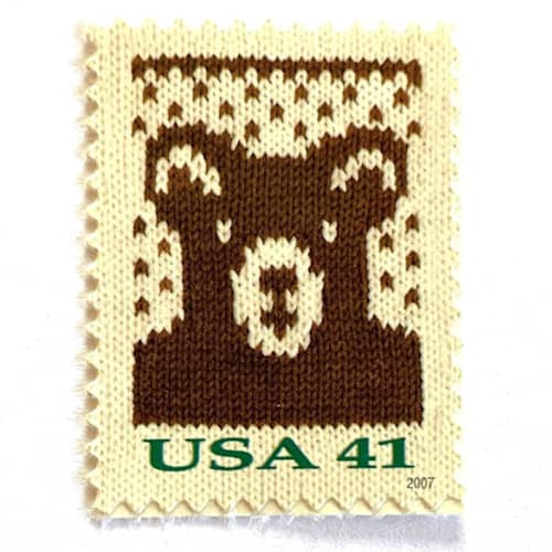 This is a brown stamps by Heritage Post House called holiday knits bear postage stamps | contemporary christmas series | christmas stamps | vintage unused usps postage 41c | pack of 10 in standard