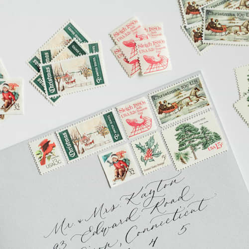 This is a gray stamps by Flourish Fine Writing called a new england christmas postage set // set of 5 // $.86 per set in standard