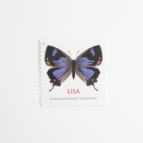 This is a purple stamps by Flourish Fine Writing called forever colorado hairstreak butterfly stamps // set of 10 // 1 ounce plus non-machinable // unused postage in standard