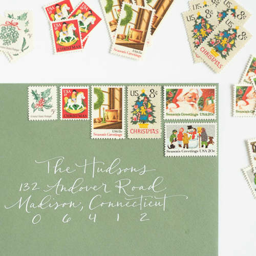 This is a red stamps by Flourish Fine Writing called snow days holiday postage set // set of 5 // unused // santa // needlepoint in standard