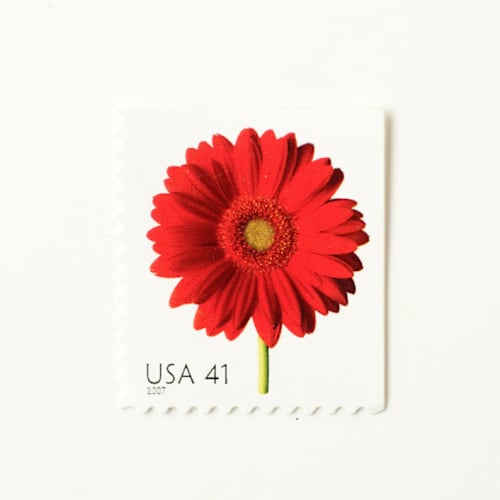 This is a red stamps by Flourish Fine Writing called 41 cent red gerbera daisy postage stamps // set of 10 // unused vintage postage in standard