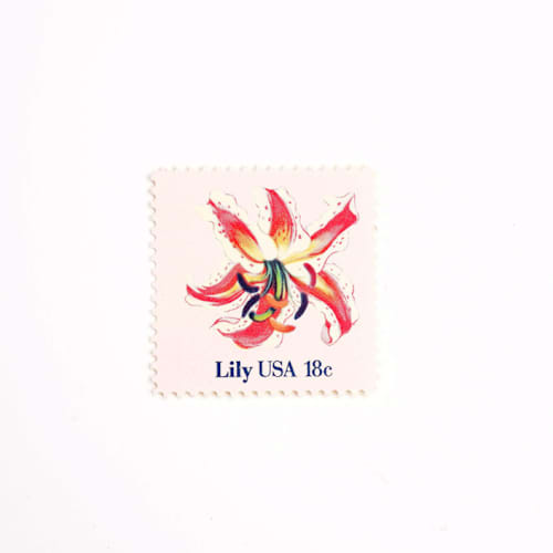 This is a pink stamps by Flourish Fine Writing called 18 cent lily flower postage stamps // set of 10 // vintage postage in standard