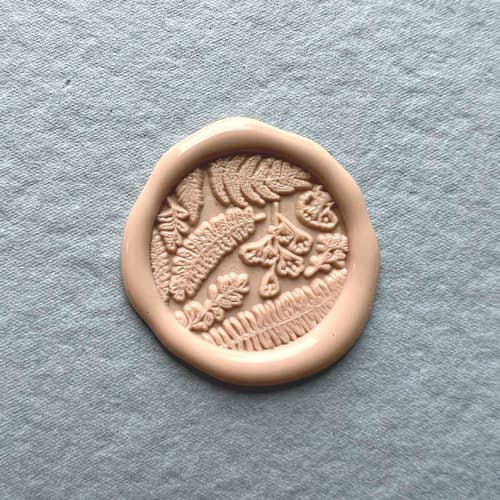This is a natural wax seals by Eva Tadros called leafy garnish wax seal sticker _ nude_ pack of 10 in standard